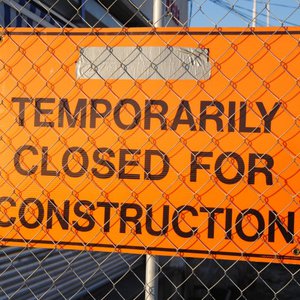Image of sign reading "Temporarily Closed For Construction"