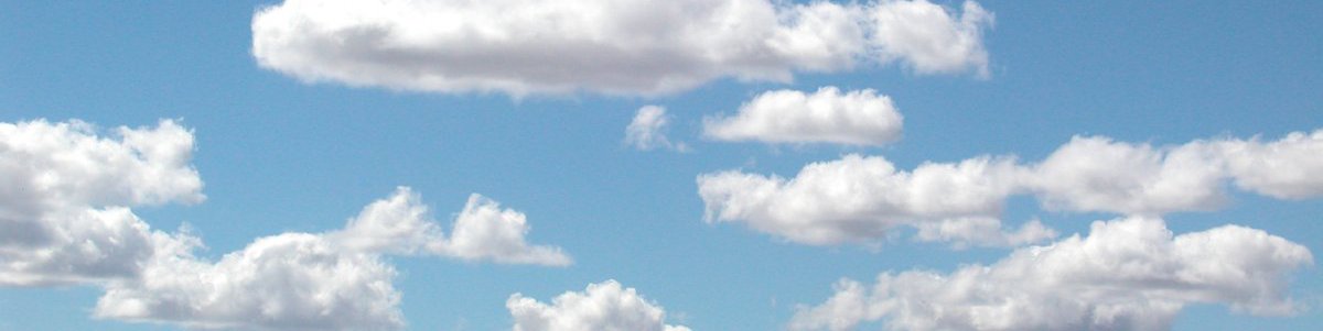 Image of blue sky and white fluffy clouds