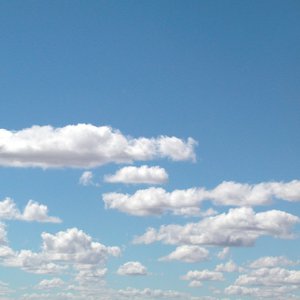 Image of blue sky and white fluffy clouds