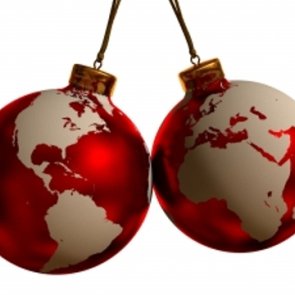 Red and white christmas tree baubles with a map of the earth on them